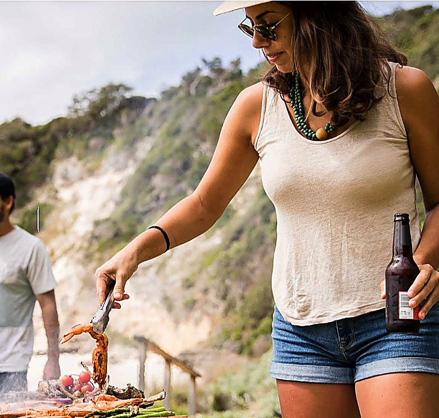 Lara grilling beachside